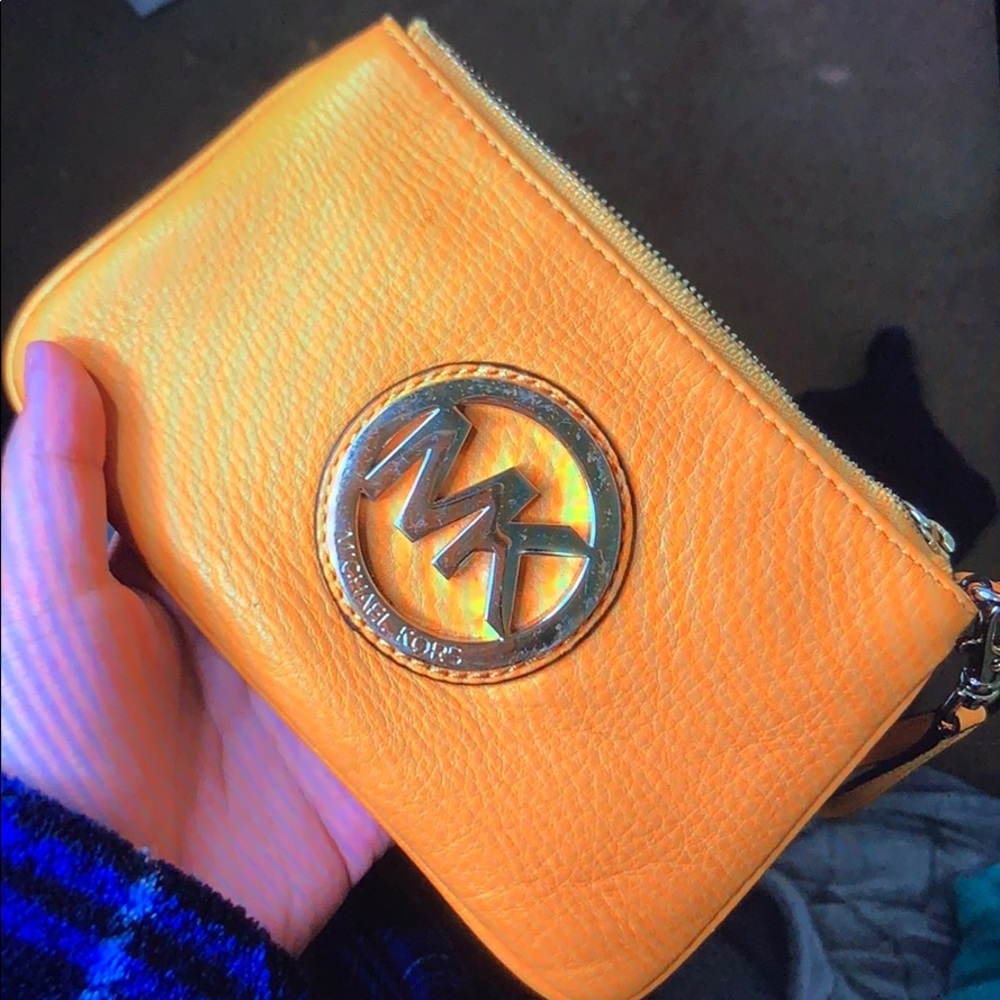 mk orange wristlet wallet